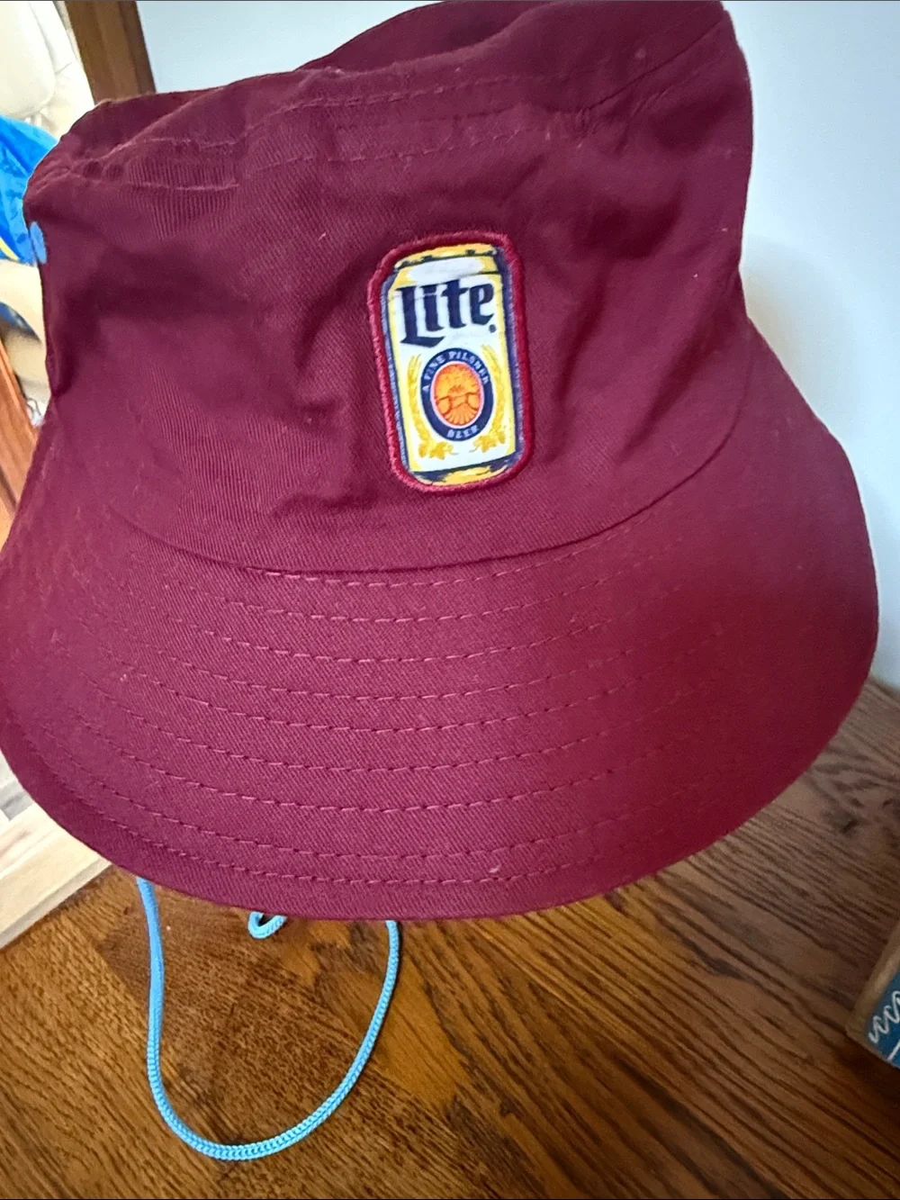 Burgundy Bucket Hat with Light Blue Chin Cord and White PhillyEmbroidered Accent